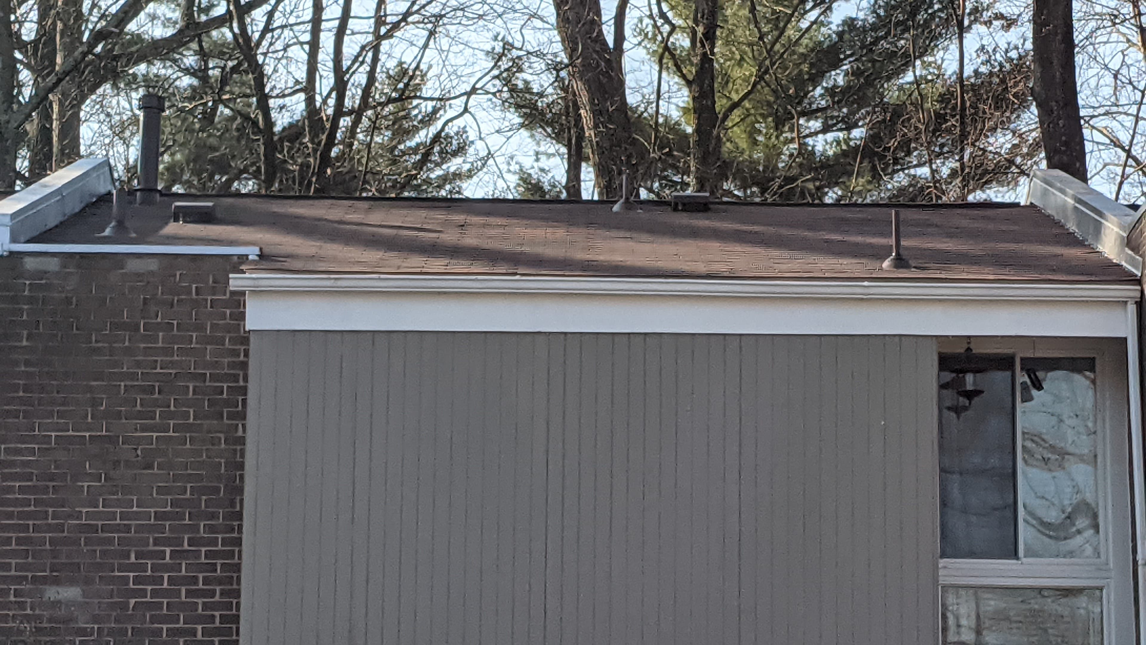 Finished asphalt shingle roof after a full replacement in Sterling